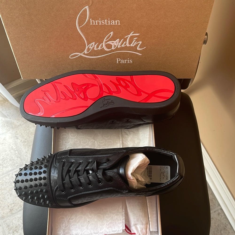 Never worn Christian Louboutin. Style: Louis Junior Spikes Orlato.